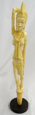 African Carved Ivory Of Nude Woman: African hand carved figure of a semi nude woman with bead decoration standing on an ivory trunk on wooden base 20 1/2" height of figure on a x 3/4" x 4" diameter baseShipping And Required Insurance Wi