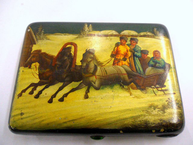 Antique Russian Silver Hand Painted Cigar Box: Antique Russian Silver hand Painted Cigarette Box. Lid Has A Painted Scene Depicting Three People In A Snowy Sled Being Pulled By 3 Horses In A Snowy Background. Silver Has A Painted Green Color And O