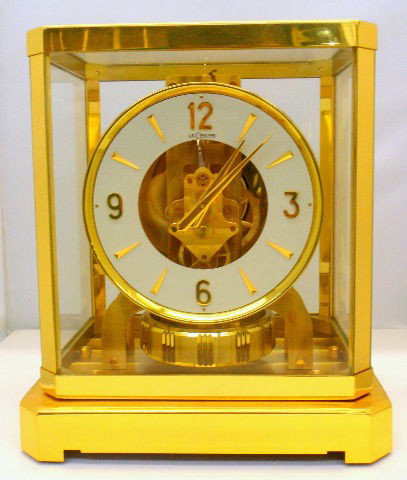 Jaeger LeCoultre Atmos Clock: Jaeger LeCoultre Atmos Perpetvalle Clock In Original Box. Classic Table Clock In Gold Plated Cabinet. Made In Switzerland. Does Not Need Manuel Winding. Retail Price $5050.00 Measures 9 1/4" High 6 1/