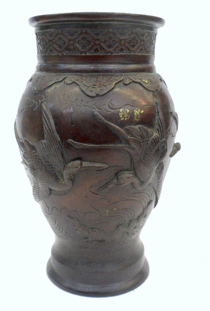 Japanese Bronze Stork Vase: Handsome Japanese Bronze Vase with Stork Design. This is a truly Impressive Bronze Vase. This Bronze Casting Of Highly Stylized Storks Displays The Hand Of A True Master Sculptor. Rich Patina And Deep