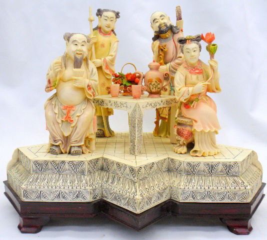 Large Japanese Ivory Grouping: Large Japanese Ivory Grouping Featuring Finely Craved And Colored Group Of Four Figures Sitting By A Table With Tea And Flowers On It. The Ivory Sits On A Fitted Wooden Base. Unknown Maker. Measures 1