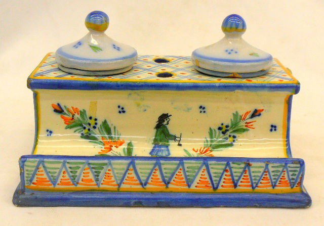 Handsome Quimper Inkwell: Hand Painted Ink Stand Limited Edition by Quimper. This Vintage Inkwell/ Pen Holder Features a Breton Peasant Woman On Front And Man On Back. The fine Detailed Painting Makes This a Remarkable Piece. 