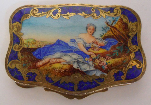 800 Silver Hand Painted & Enamel Compact: A true collector's find, this Silver Hand-Painted & Enamel Compact has very nice enamel work depicting a woman laying down on a bed of flowers outdoors with a beautiful blue sky in the background. Cob