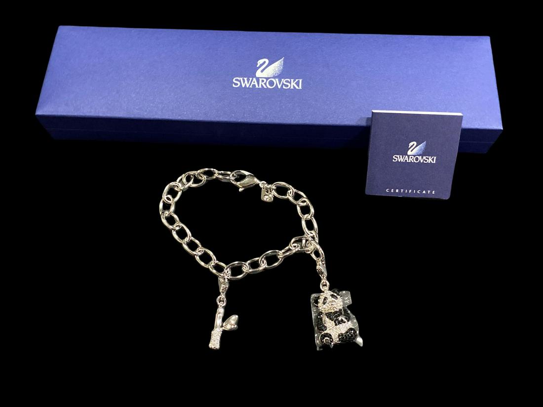 Swarovski Charm Silver Metal Link Bracelet: Swarovski Charm Silver Metal Link Bracelet with Two Swarovski Charms, a sitting Panda and a Stack of Bamboo with Original Box measures 8 1/4"