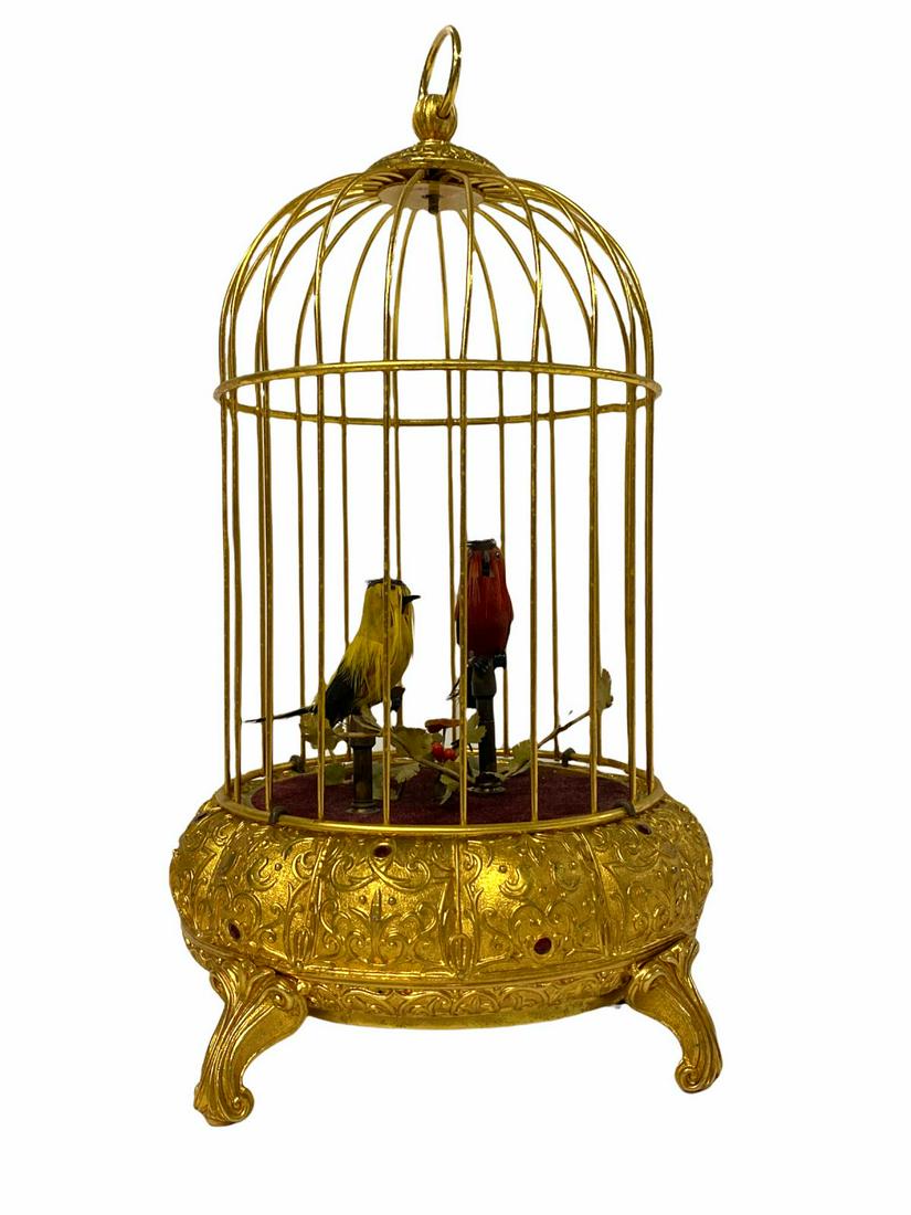 Germany Brass Singing Bird Cage Music Box: Germany Brass Singing Bird Cage Music Box measures H: 10 1/2"