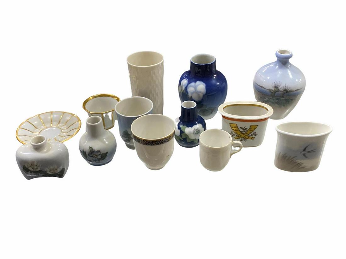 Lot of 13 Royal Copenhagen Porcelain Misc Set: Lot of 13 Royal Copenhagen Porcelain Misc Set includes 10 miniature vases, 2 demitasse cups and 1 saucer. Largest measures H: 4 3/8"