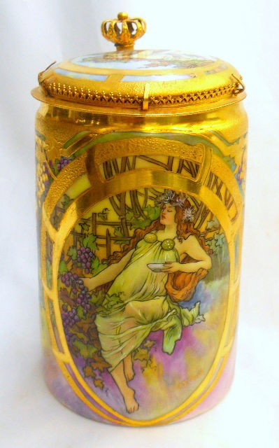 Royal Vienna Hand Painted Stein: Bautifully hand painted Royal Vienna Stein. This stein measures 6" tall and is detailed all in gold. The Royal Vienna marking is on the bottom of the stein. Minor Wear on the handle where the lid atta