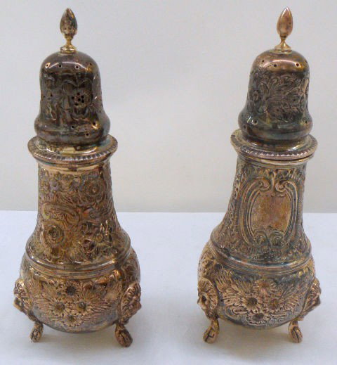 Antique Hand Chased Sterling Silver Salt & Pepper: Antique hand chased sterling silver salt and pepper shakers. Measure about 6-3/4" tall. Both marked; Hand Chased, Sterling and are in very good condtion. Shipping Within The Continental US $30 plus Re