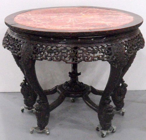 Antique Hand Carved Chinese Marble Top Table: Antique Chinese hand carved inset marble top table, circa early 1900's. Measures 31" tall, marble is 36" in diameter and table overall is 42" in diameter. This table has some damage to the carvings ar