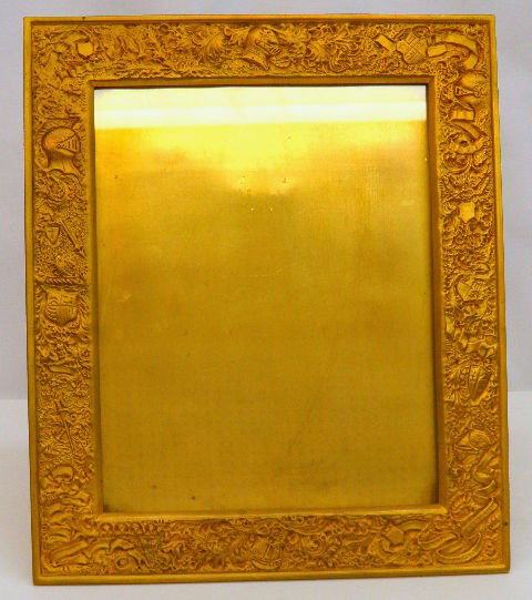 Tiffany Favrille Dore Bronze Gilt Frame: Louis C Tiffany Favrille Dore Bronze frame with a gilt gold finish. Back is marked "Louis C Tiffany Furnaces Inc" The bottom right of the frame is inscribed in Latin "Omnia Veritas Vincit" (The truth 