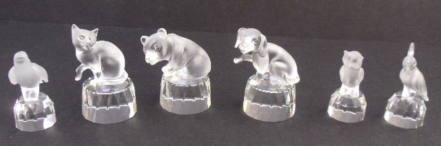 Set of Six Frosted Swarovski Figurines. : Set of six beautifully detailed frosted Swarovski figurines all on a clear crystal plinths. Featuring a cat at play, a crouching bear, an owl, a miniature parrot, a dove and a dog at play. These figur