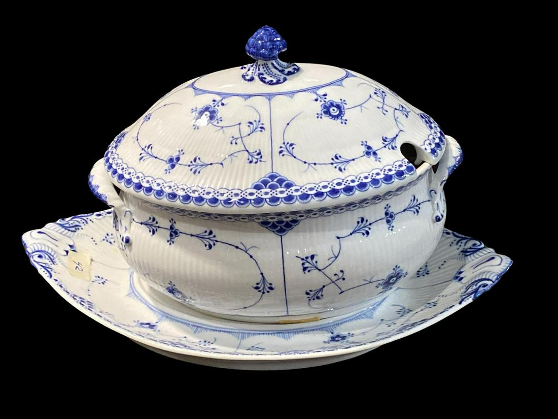 Royal Copenhagen Blue Fluted Tureen with Under Dish: Royal Copenhagen Blue Fluted Tureen with Under Dish. Tureen measures 11" x 14" and dish measures 02" x 12". The cover has a crack, sold as is
