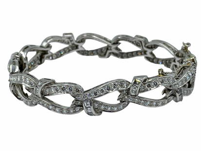 Mid Modern Platinum and 12.00ct Diamond Bracelet: Mid Modern Platinum and 12.00ct Diamond Bracelet measures 7 1/4", 22dwt/34.21g. 250 Diamonds