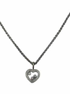 Chopard 18kt WG and Happy Diamond Heart Necklace: Chopard 18kt WG and Happy Diamond Heart Necklace measures 17"
