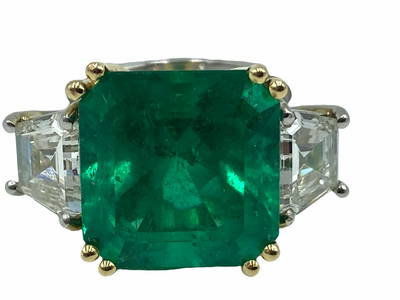 Platinum, 18kt YG, 9.55ct Emerald Cut Emerald and 2.45ct Trapezoid Diamond Ring