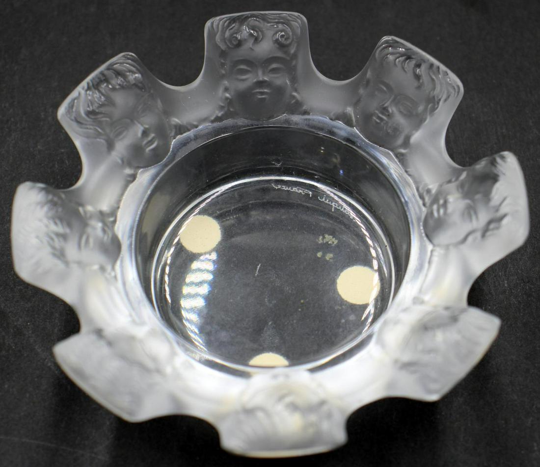 Lalique French Crystal Cigarette Holder: Lalique French crystal ashtray cigarette holder. Measures approx. 1 1/2" height x 4 1/4" diameter.