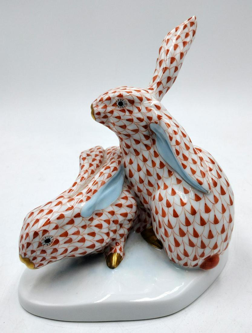 Pair Of Herend Hungarian Fishnet Porcelain Hares: A pair of Herend Hungary hand painted fish net animal sculptures depicting rabbits. Each measures approx. 5 3/4" height.