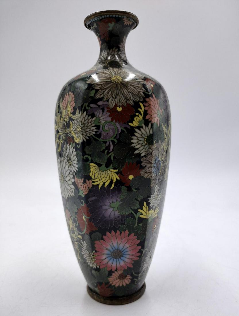 Japanese Meiji Cloisonne Enameled Silver Rim Vase: Antique Japanese Meiji period cloisonne enameled metal vase completed with silver rims. Measures approx. 6" height.