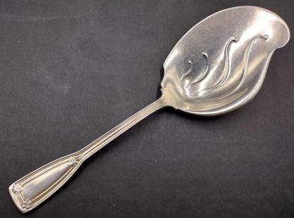 Tiffany & Company Sterling Silver St. Dunstan Ice Cream Serving Spoon: Tiffany And Company American sterling silver ice cream serving spoon in the "St. Dunstan" pattern. Fully hallmarkedâ€¦see photos. Measures approx. 8 1/4" length. Total weight approx. 2.68ozt.