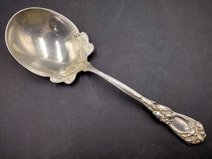 Durgin "Iris" Sterling Silver Salad Serving Spoon: Durgin American sterling silver salad serving spoon in the "Iris" pattern having an Art Nouveau design. Crafted to be retailed by Shreve, Crump & Low. Measures approx. 9 1/4" length . Total weight