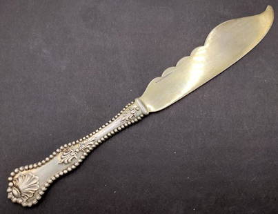 Black Starr & Frost Sterling Silver Flat Master Butter Spreader: A vintage Black, Starr & Frost American sterling silver flat / solid master butter spreader having a beaded and shell design. Measures approx. 7 3/4" length. Total weight approx. 1.71ozt.