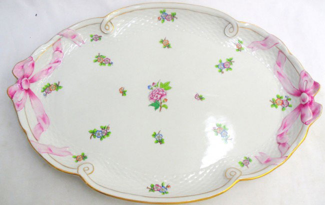 Herend Pink Ribbon Porcelain Serving Platter: Beautiful, large Herend "Guirlande de Liechtenstein" pink ribbon serving platter. Herend model #400/LTBS, marked with Herend logo on bottom. Made in Hungary. Measures 16" long x 11" wide. Shipping wit
