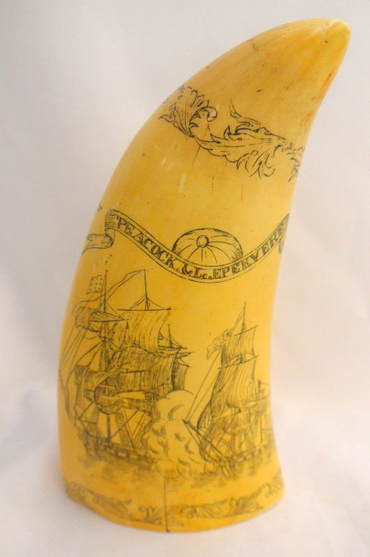 Magnificent Ivory Scrimshaw Entitled "Liberty": Magnificent scrimshaw ivory with shipping design on one side and colored maiden on other side wrapped in an American flag entitled "Liberty". There is some discoloration and an age crack on one side b