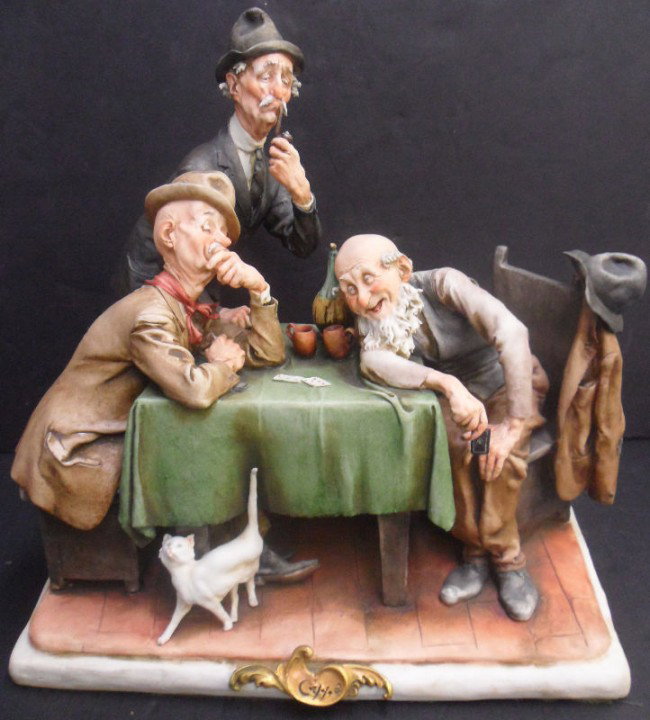 Capodimonte Three Figure Group: Capodimonte Three Figure Group of Three old men playing cards and drinking. Unmarked. Measures 12" high x 12" wide. Please call for shipping plus required insurance quotes 561-585-9999 or email us at 