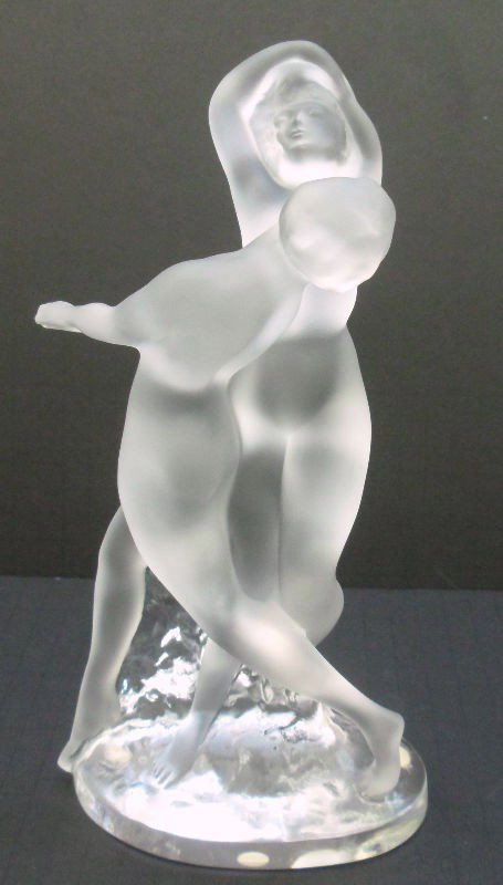 Lalique Crystal Figure of Two Dancers: Stunning frosted figure of two dancers with clear crystal worked into the sculpture at its base. Designed by Marc Lalique in 1960, Signed Lalique France. These two dancers by Lalique represent grace a