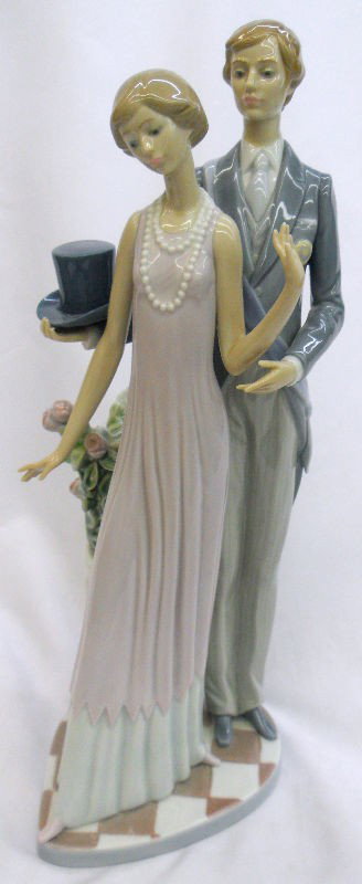Lladro ''High Society'' Retired Figurine: This stunning piece of Lladro entitled "High Society" is hand-painted porcelain and was issued in 1982 and retired in 1992. It is #01011430 and is in perfect condition. Handmade in Spain and marked Ll