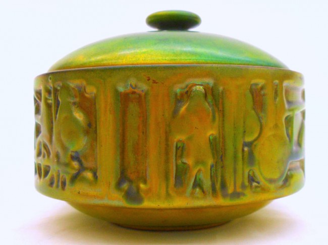 Rare Zsolnay Porcelain Covered Jar: Rare, stunning Art Nouveau covered jar by Zsolnay featuring an irridescent green and gold eosin metallic glaze. There is some pale purple highlights that bring out the various decorative elements. Thi