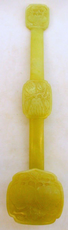 Chinese Jade Ruyi Scepter: This Chinese jade scepter is flawless and features a superb example of craftmanship. The jade scepter features three medallions all carved in deep relief. The scepter represents the power of a high go