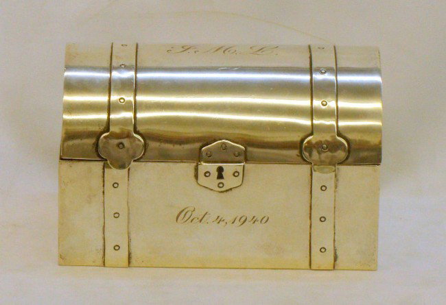 Black Starr & Frost Sterling Jewelry Box: Signed Black Starr and Gorham Sterling Silver jewelry box having fitted blue velvet interior, the exterior modeled as a vintage steamer trunk. Dated October 4th, 1940. Total weight is 11 oz. Measures 