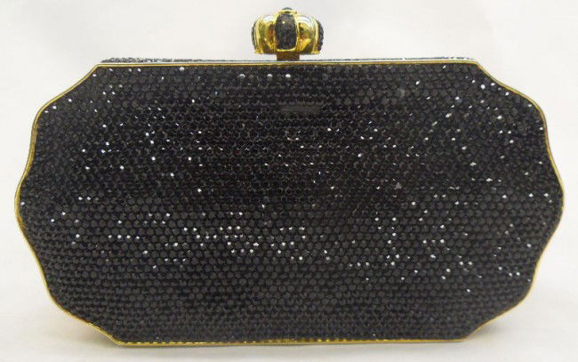 Judith Leiber Black Crystal Purse: A truly elegant pave crystal purse beautifully designed with black Austrian crystals by Judith Leiber. The interior is gold leather and is signed Judith Leiber New York inside. The purse had a gold sh