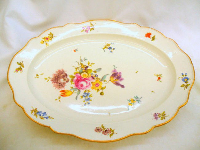 Meissen Porcelain Hand-painted Turkey platter: Meissen hand-painted porcelain turkey platter. Flower decoration in the center. Measures 2 1/2" high x 20 1/2" wide. Shipping within the continental US is $40 plus Required insurance. For internationa