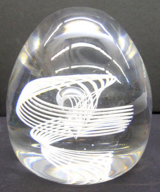 Collectible Steuben Egg Shaped Paperweight: Highly collectible Steuben Egg Shaped Paperweight with white swirl design in the inside of the paperweight. Signed Steuben on bottom. This paperweight is a real beauty! Measures 3" high x 3" diameter.