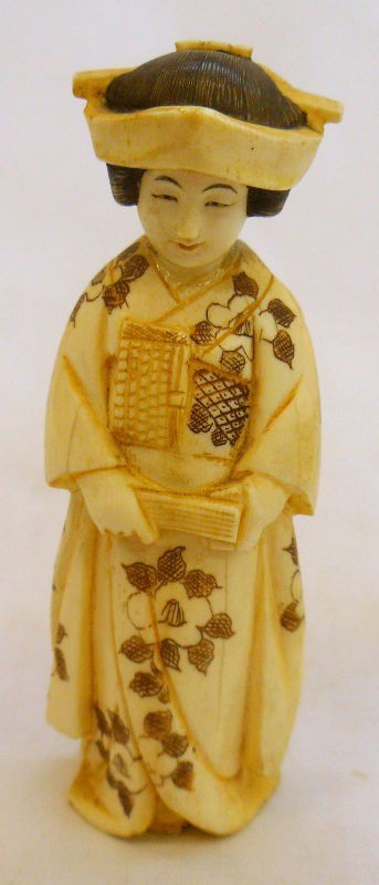 Important Chinese Polychrome Ivory Figure: Finely detailed polychrome Chinese Ivory Figure of a woman in a kimono robe. The coloring on this piece and the carving is truly magnificent. Unknown signature mark on the bottom. Don't miss out! Meas