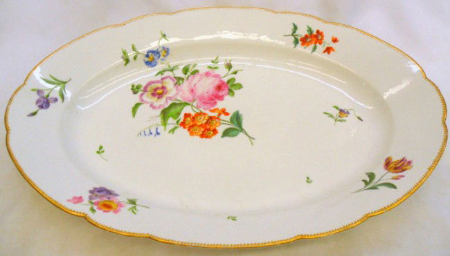 Meissen Hand-painted Porcelain Turkey Platter: Meissen hand-painted porcelain turkey platter with flower decoration in center. Measures 2 1/4" high x 19 1/4" wide. Shipping within the continental US is $40 plus Required insurance. For internationa