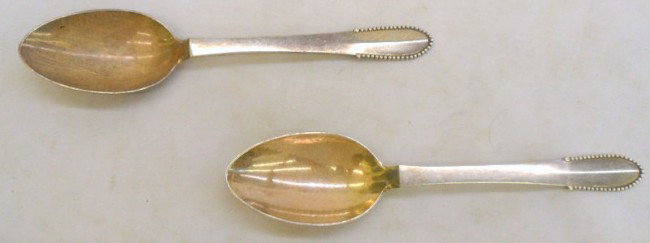 Pair of Georg Jensen Sterling Beaded Spoons: Pair of Georg Jensen Sterling Silver "Beaded" serving spoons. Marked Georg Jensen Sterling on back. Measures 8" high x 1 3/4" wide. Shipping within the continental US is $10 plus Required insurance. F