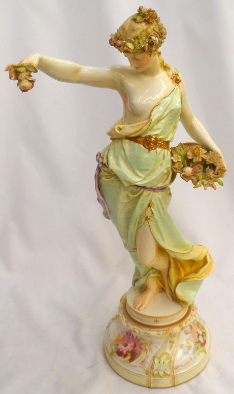 Antique KPM Porcelain Figurine: Lovely antique KPM porcelain figure of a woman that is truly of museum quality, c. 19th century. This piece is extremely rare and of exceptional workmanship. The figure itself is partially unrobed and