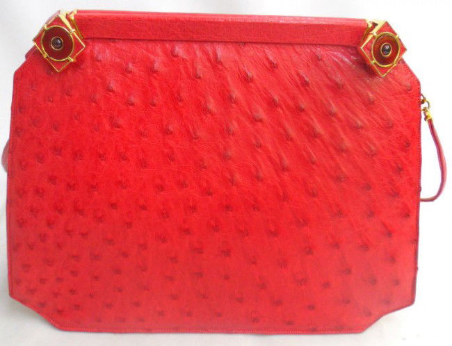 Judith Leiber Red Ostrich Purse: Fabulous, authentic Judith Leiber red ostrich purse. The purse comes with original coin purse inside. Don't miss out on this opportunity to own a very special Judith Leiber purse. Measures 7" high x 9