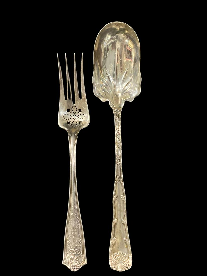 Tiffany & Co Sterling Silver Fork and Spoon Servers: Tiffany & Co Sterling Silver Fork and Spoon Servers measures 9" and 10 1/4", weighs 6.73 OZT