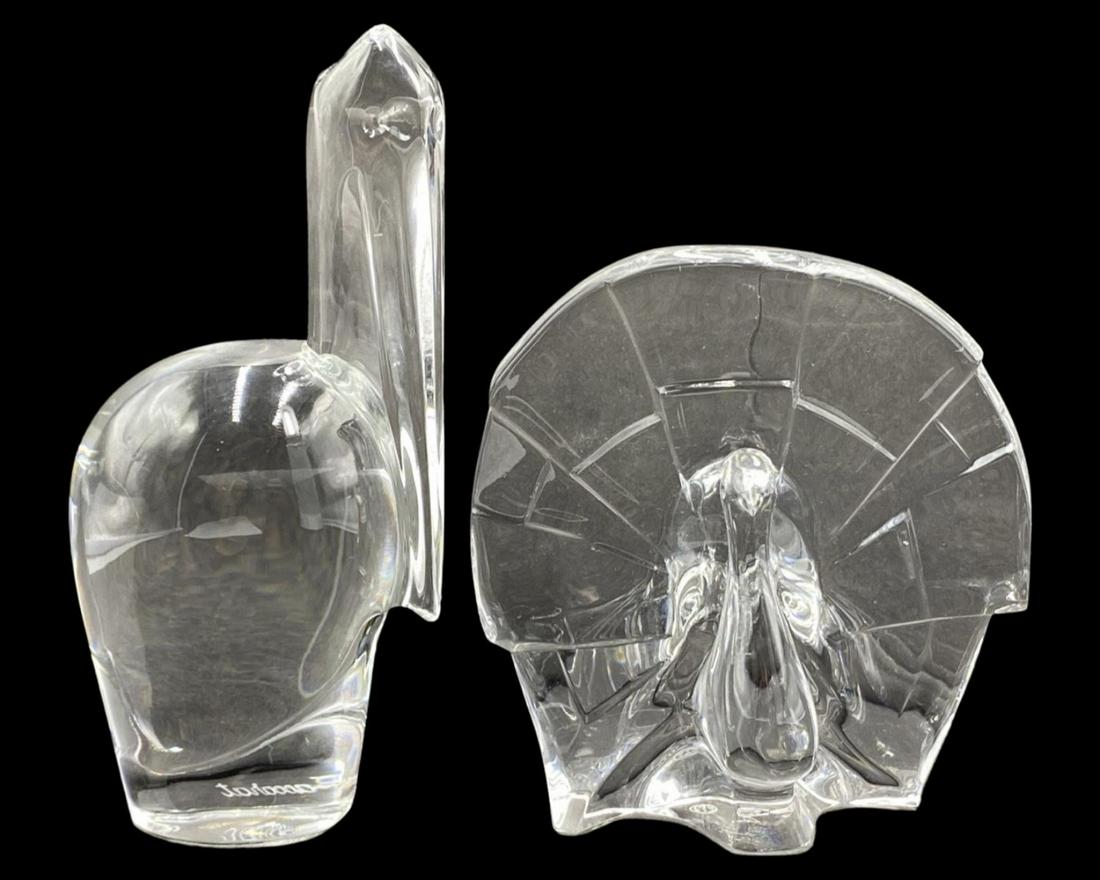 Pair of Baccarat France Crystal Figurines: Pair of Baccarat France Crystal Figurines includes Peacock measures H: 4 1/2" and Pelican measures H: 6 1/4"