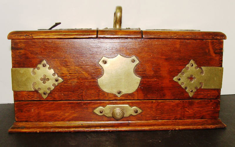 Vintage Cigarette and Cigar Box: Vintage Cigarette and Cigar Box. Box features split design with cigar or cigarette storage box, box had drawer with brass accents throughout. Top enscribed "Cigars", "Cigarettes". Measures 6 3/4" high