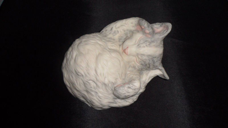 Adorable Cybis Kitten Porcelain: Adorable Cybis kitten porcelain, depicting a kitten sleeping in a awkward position. Measures 2 3/4" high x 5 1/2" wide. Shipping within the continental US is $20 plus Required insurance. For internati