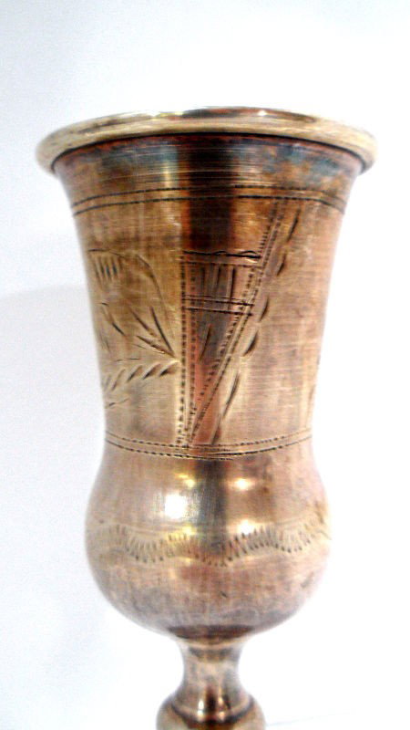 Russian Silver Kiddish Cup: Russian silver kiddish cup. Etched footed kiddish cup with "84" marking. Weighs 2 toz. Measures 4 1/4" high. Shipping within the continental US is $15 plus Required insurance. For international shippi