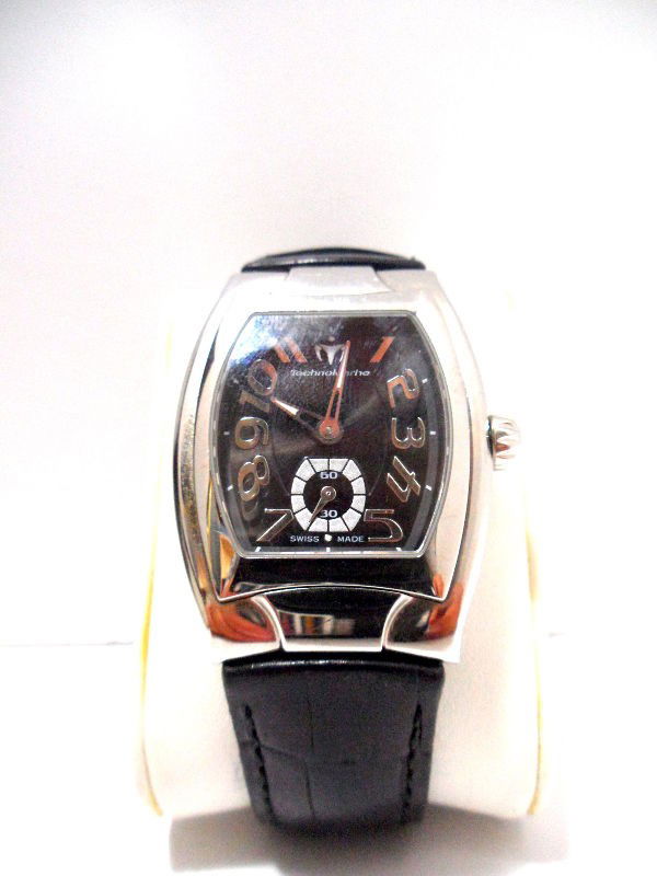 TechnoMarine Stainless Steel Watch: Fabulous Stainless steel TechnoMarine watch with sapphire crystal and removable band. This watch has black leather band with original box & papers. This watch has a swiss made movement. Watch retailed