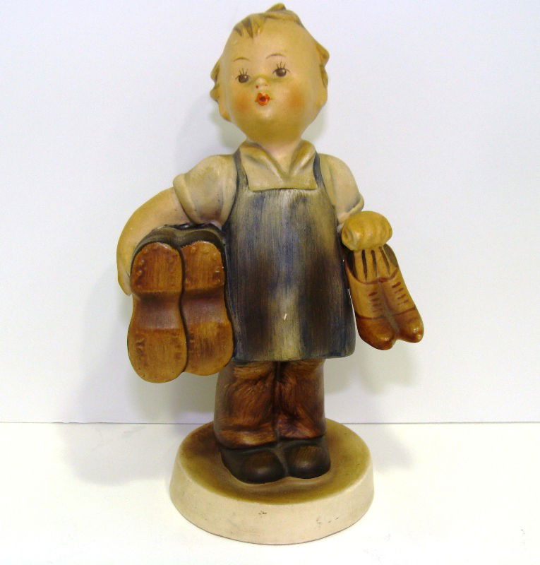 Hummel "Boots" Figure 143/0 TMK-3: Hummel Figure 143/0 TMK-3, "Boots". Measures 5" high. Shipping within the continental US is $15 plus Required insurance. For international shipping and required insurance quotes please email us at liv