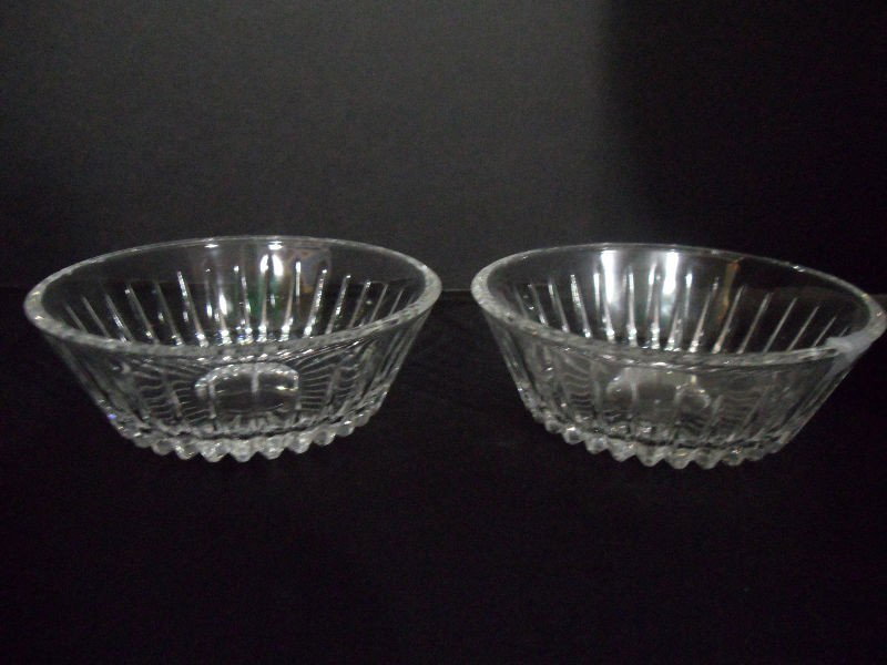 Val St. Lambert Crystal Dessert Bowls (8): Fabulous set of eight Val St. Lambert dessert bowls in the Balmoral pattern. Each one bears an etched signature on the bottom. 1 3/4"H, 5"D. Shipping within the continental US is $35 plus Required ins