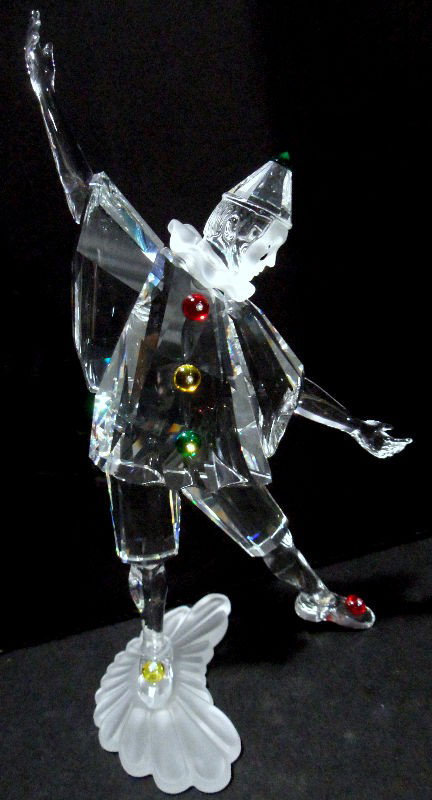 Swarovski Figure of "Masquerade Pierrot": Swarovski figure of "Masquerade Pierrot" from the 1999 Annual Edition. The piece is provided with a certificate of authenticity, and the original box is available. 8"H. Shipping within the continental